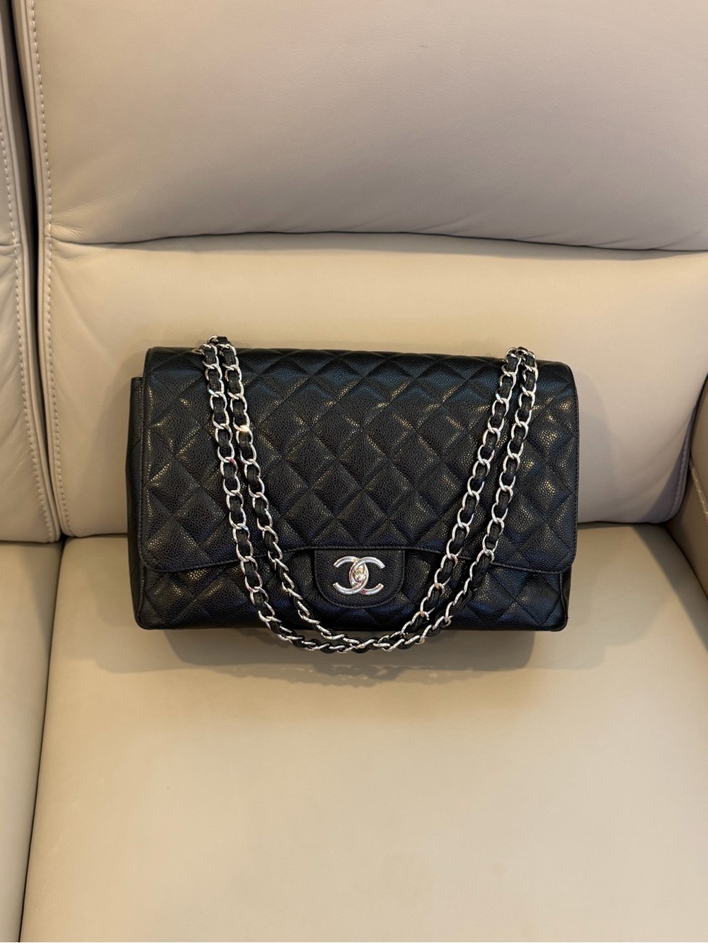 CHANEL Black Quilted Leather Shoulder Bag with Silver-Tone Chain